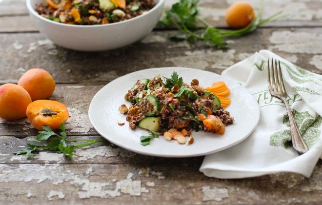 Apricot Quinoa Summer Salad plated with napkin and fork